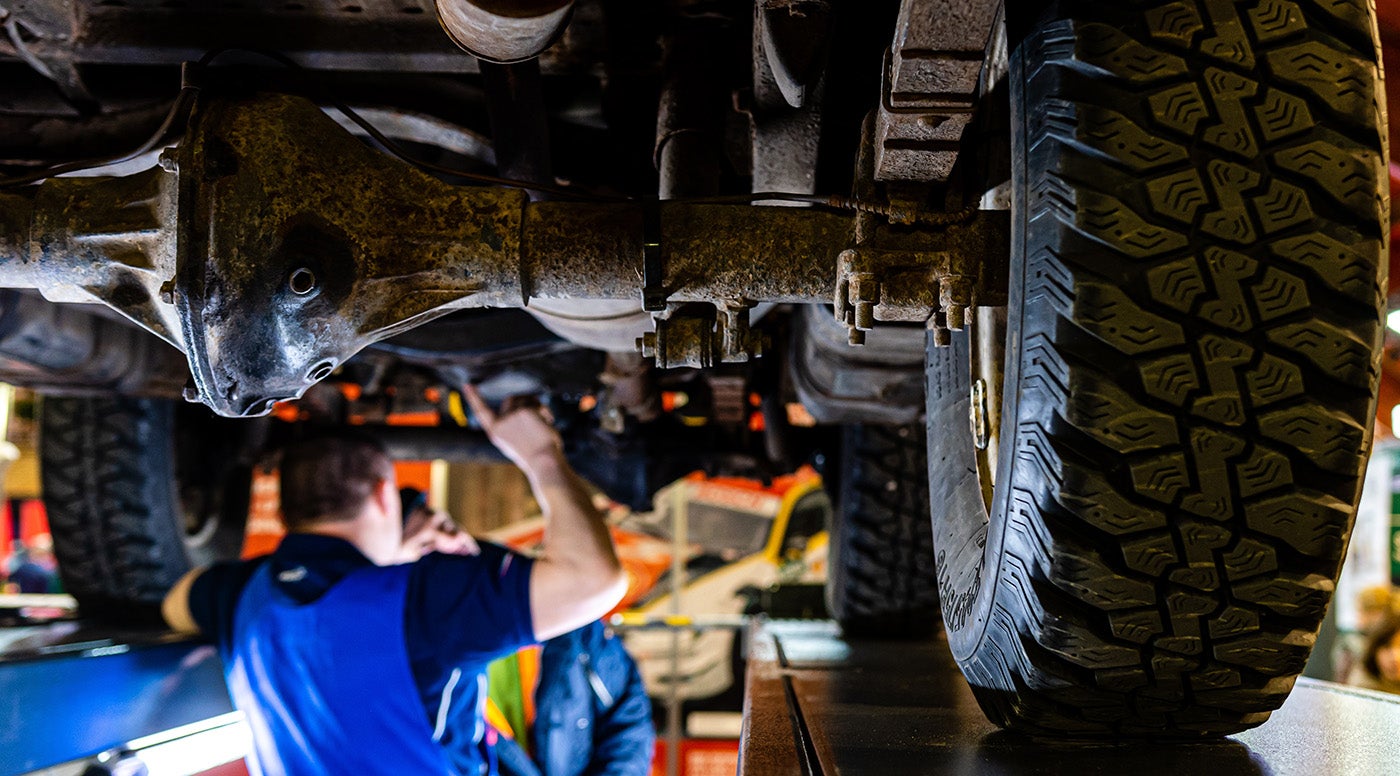 Mechanic Working Underneath a Vehicle
